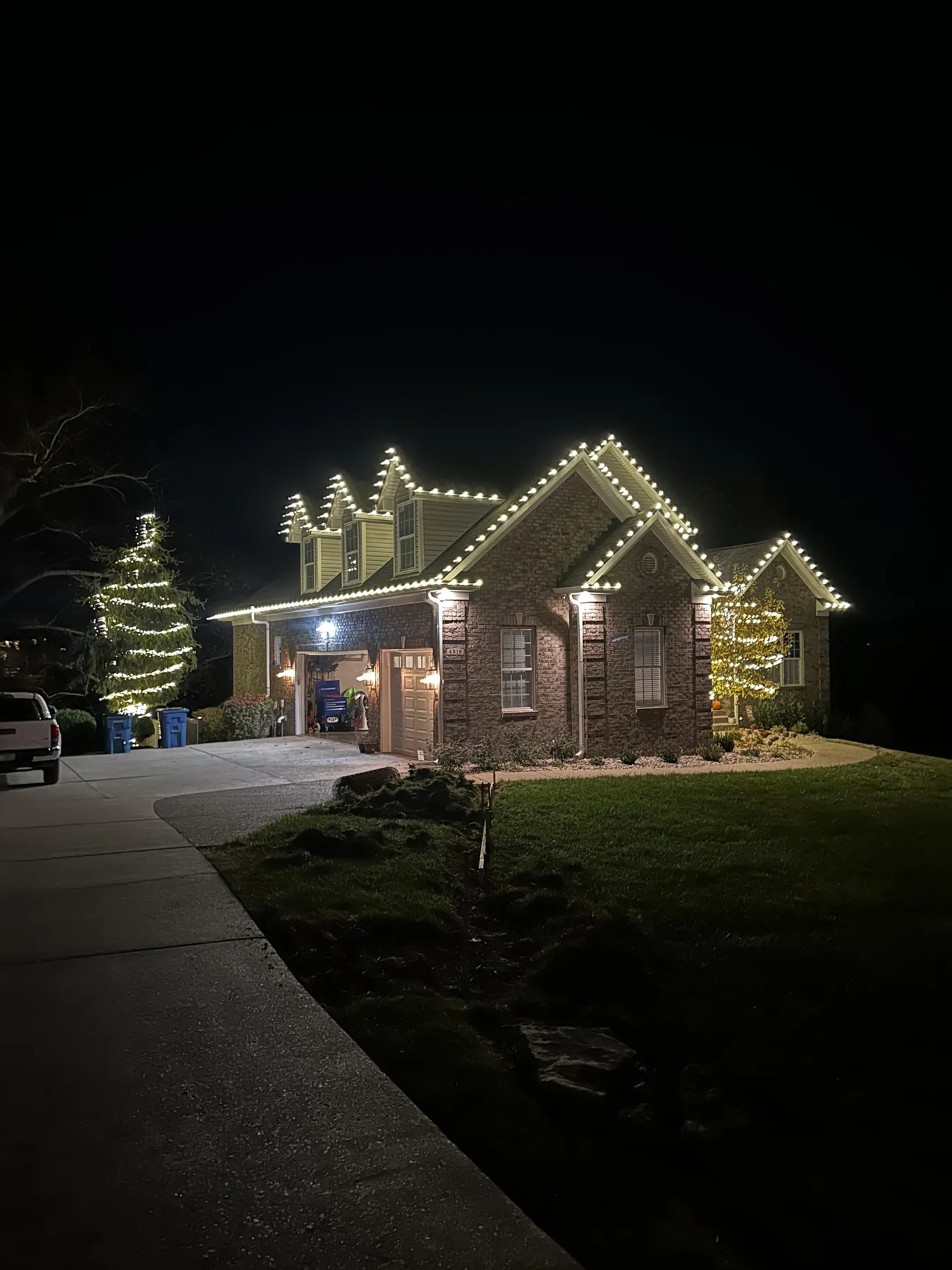 Tall home with a warm white roofline by Prestige, November 2023